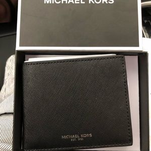 brand new michael kors andy wallet.